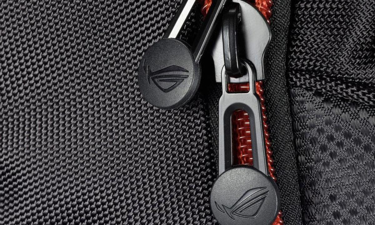 Close up view of a zipper on an Asus ROG Nomad V2 backpack.
