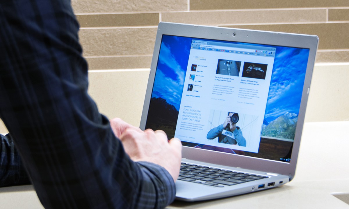 A person working on a Toshiba Chromebook.