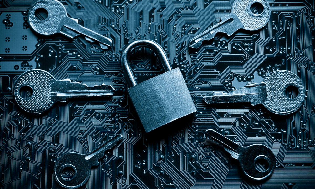 A lock surrounded by keys.