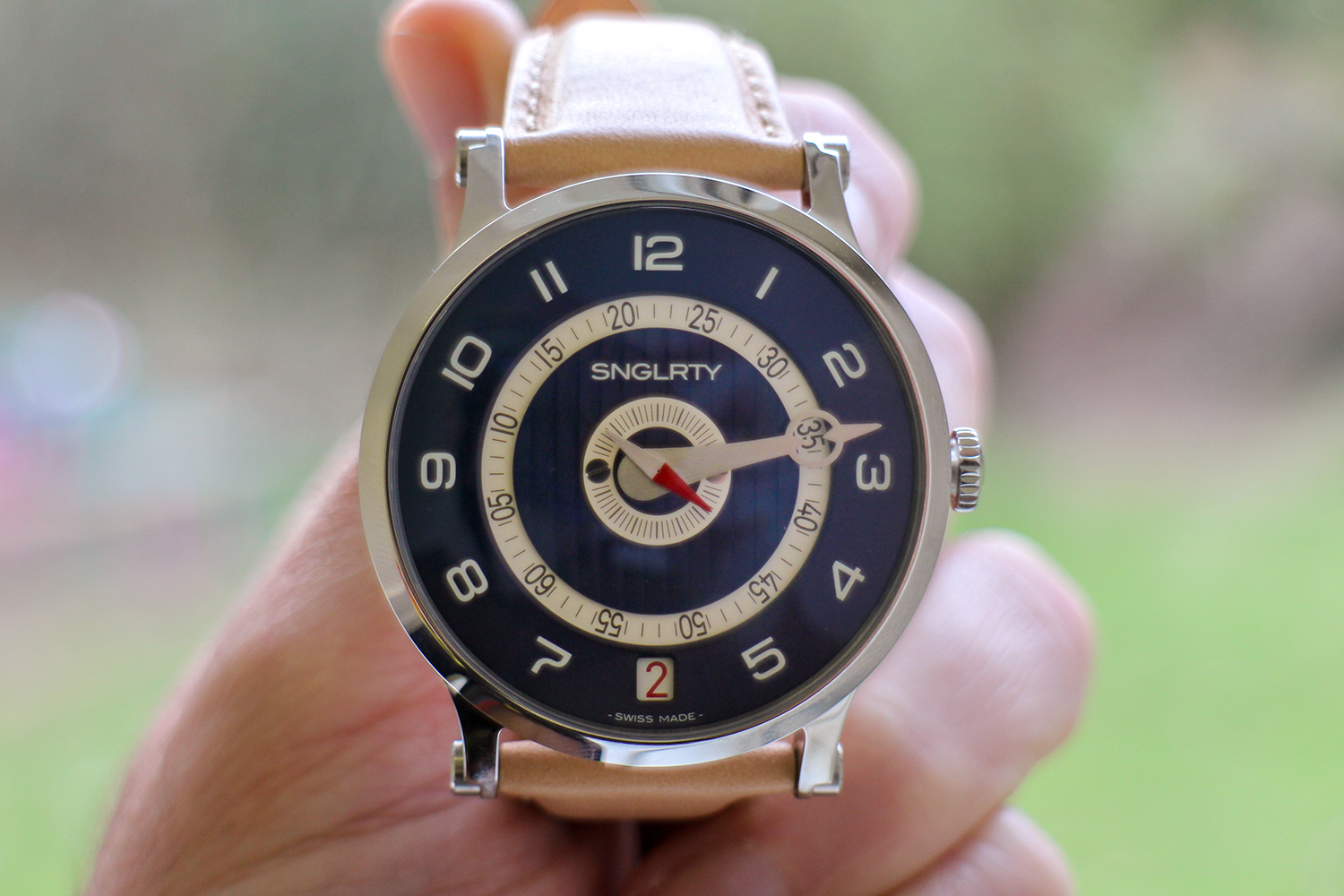 SNGLRTY watch front face