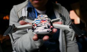 DJI Mavic Mini held in hand