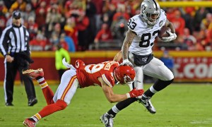 The NFL's Daniel Sorensen tries to tackle Darren Waller