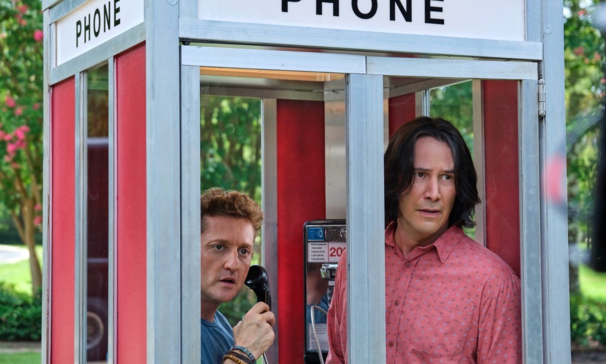 Alex Winter and Keanu Reeves in a phone booth in a scene from the movie Bill & Ted Face the Music.
