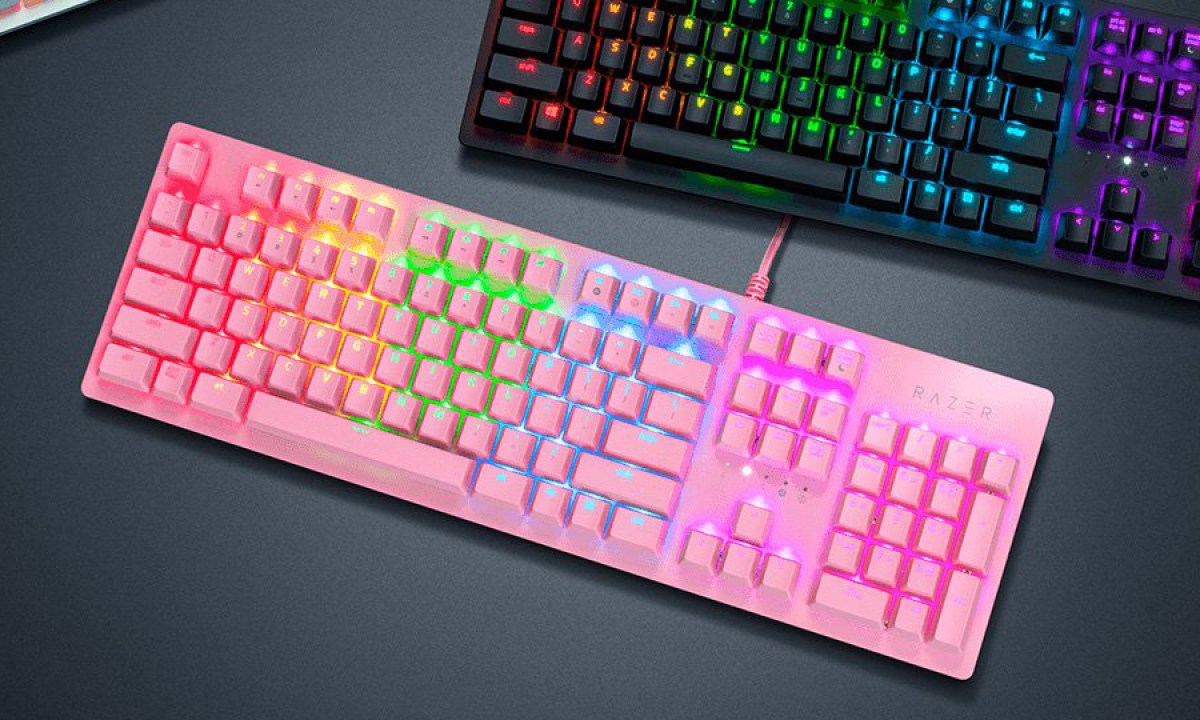 The Razer Huntsman Quartz Edition Mechanical Gaming Keyboard next to a traditional keyboard.