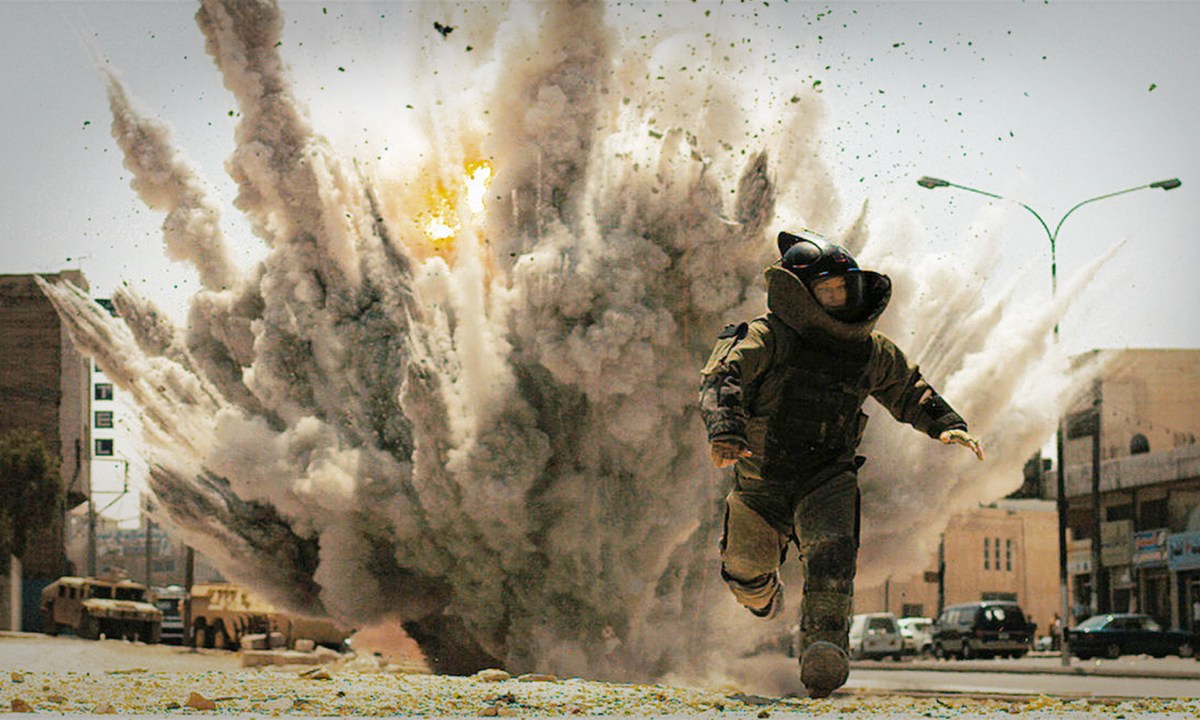 Jeremy Renner runs from an explosion in The Hurt Locker.