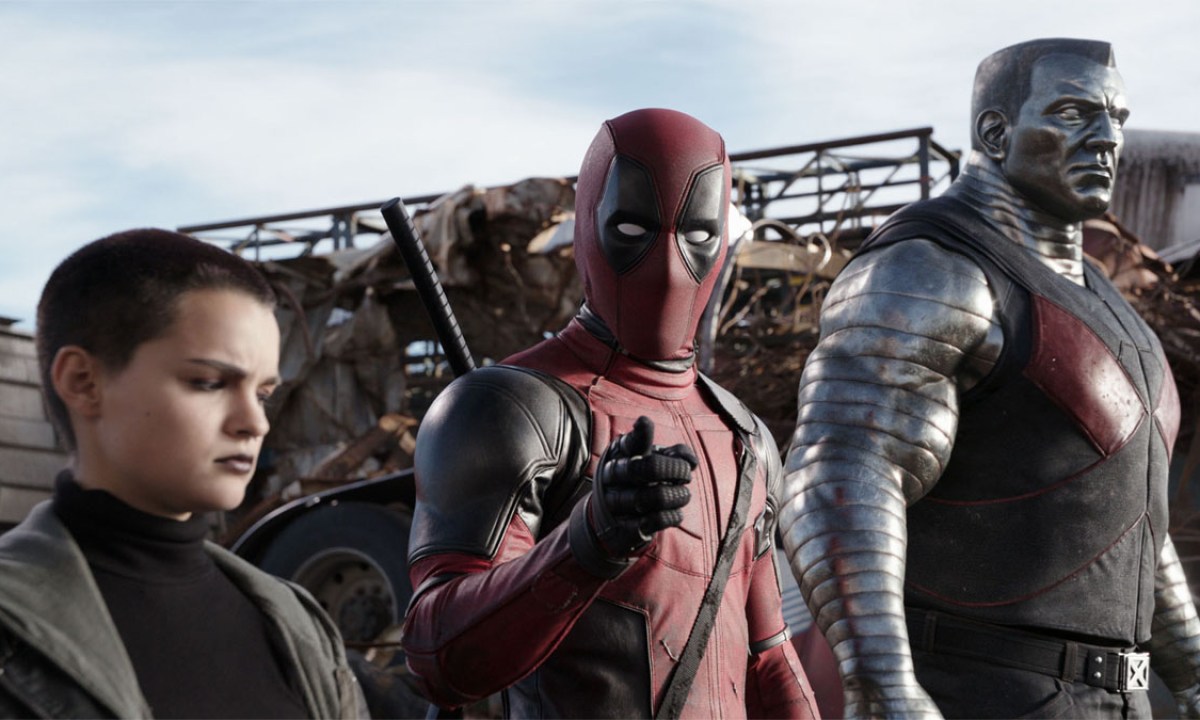 Brianna Hildebrand and Ryan Reynolds as Negasonic Teenage Warhead and Deadpool next to a CGI Colossus in Deadpool