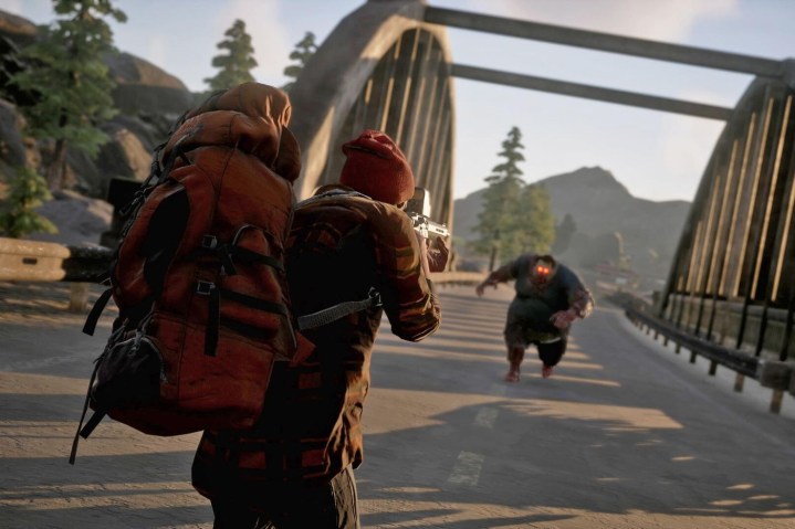 A man shoots a zombie in State of Decay 2.