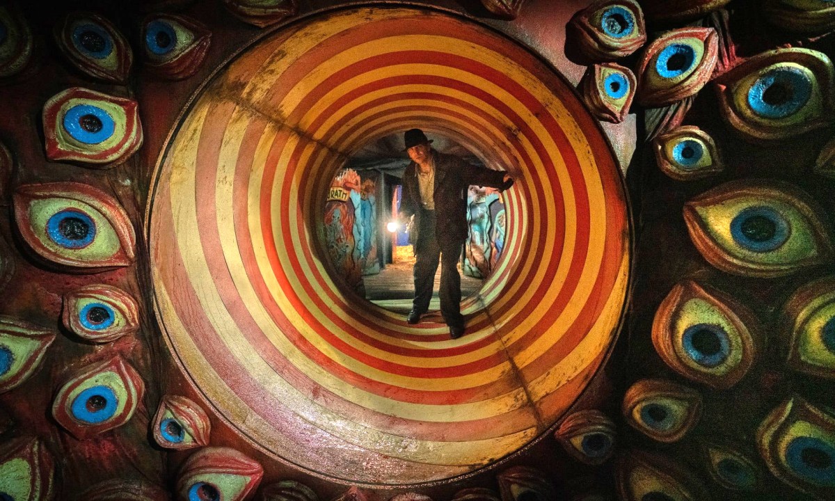 Bradley Cooper navigates a carnival funhouse in Nightmare Alley.