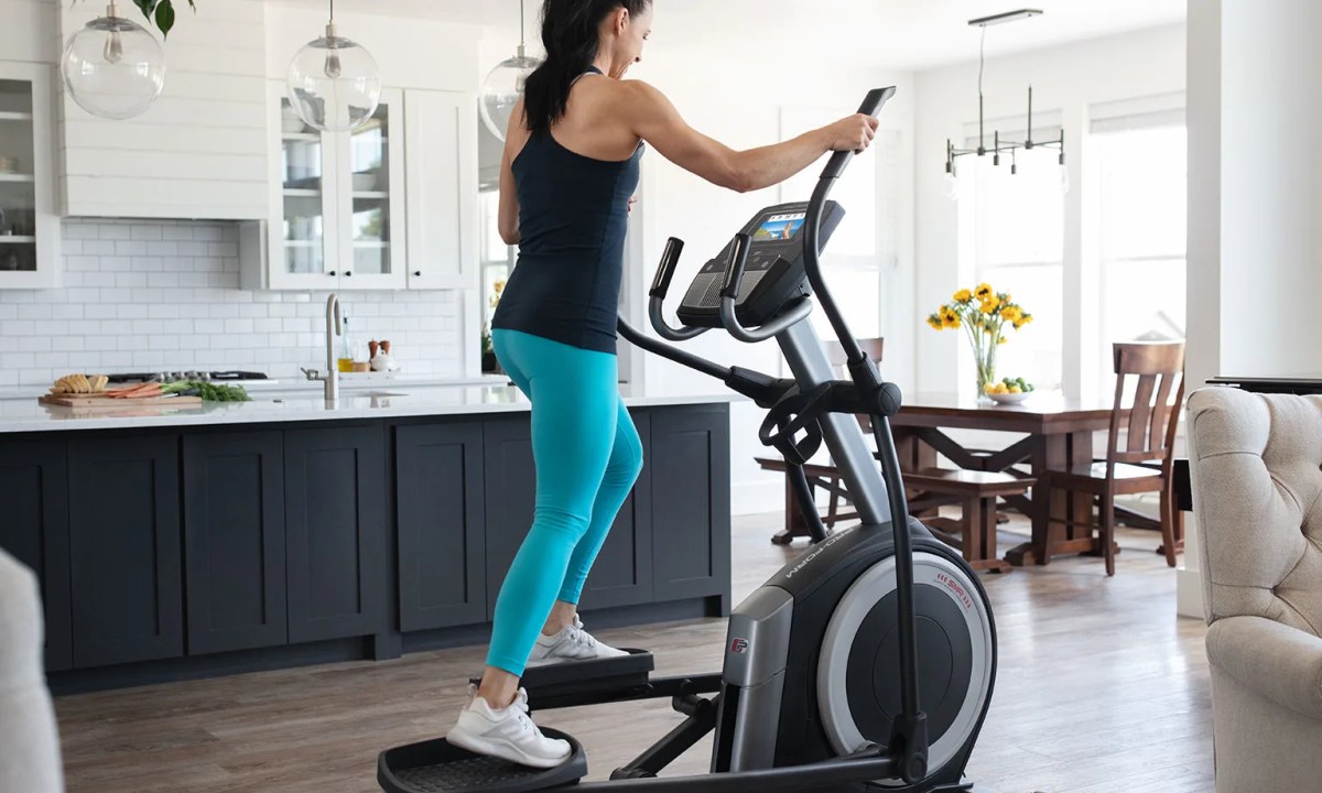 Woman on an elliptical.