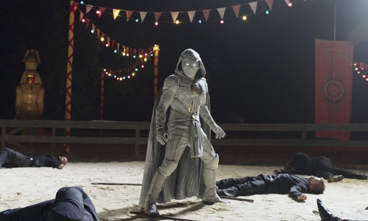 Moon Knight stands over a crowd of beaten criminals in Moon Knight.
