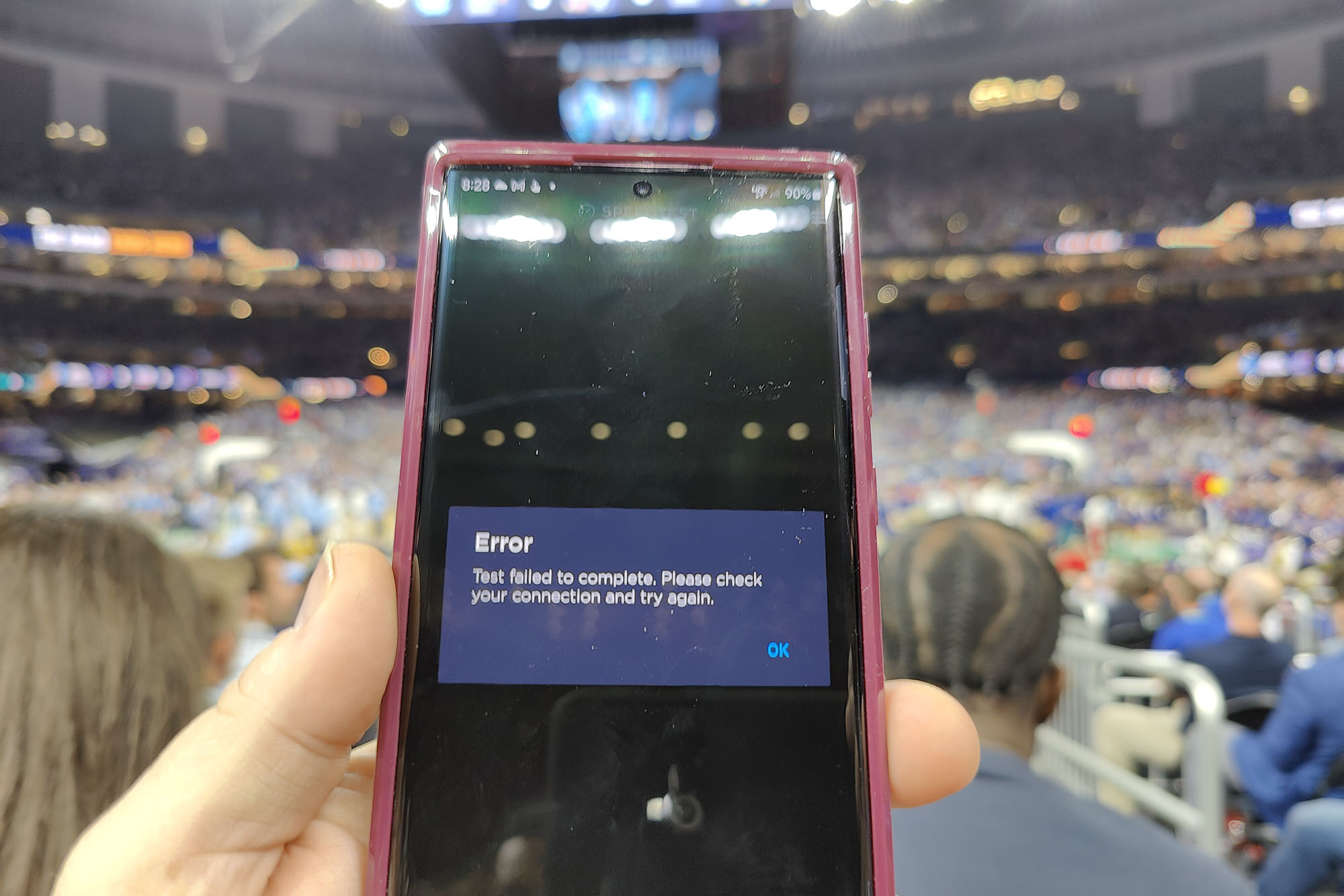 5G test with a basketball game in the background.