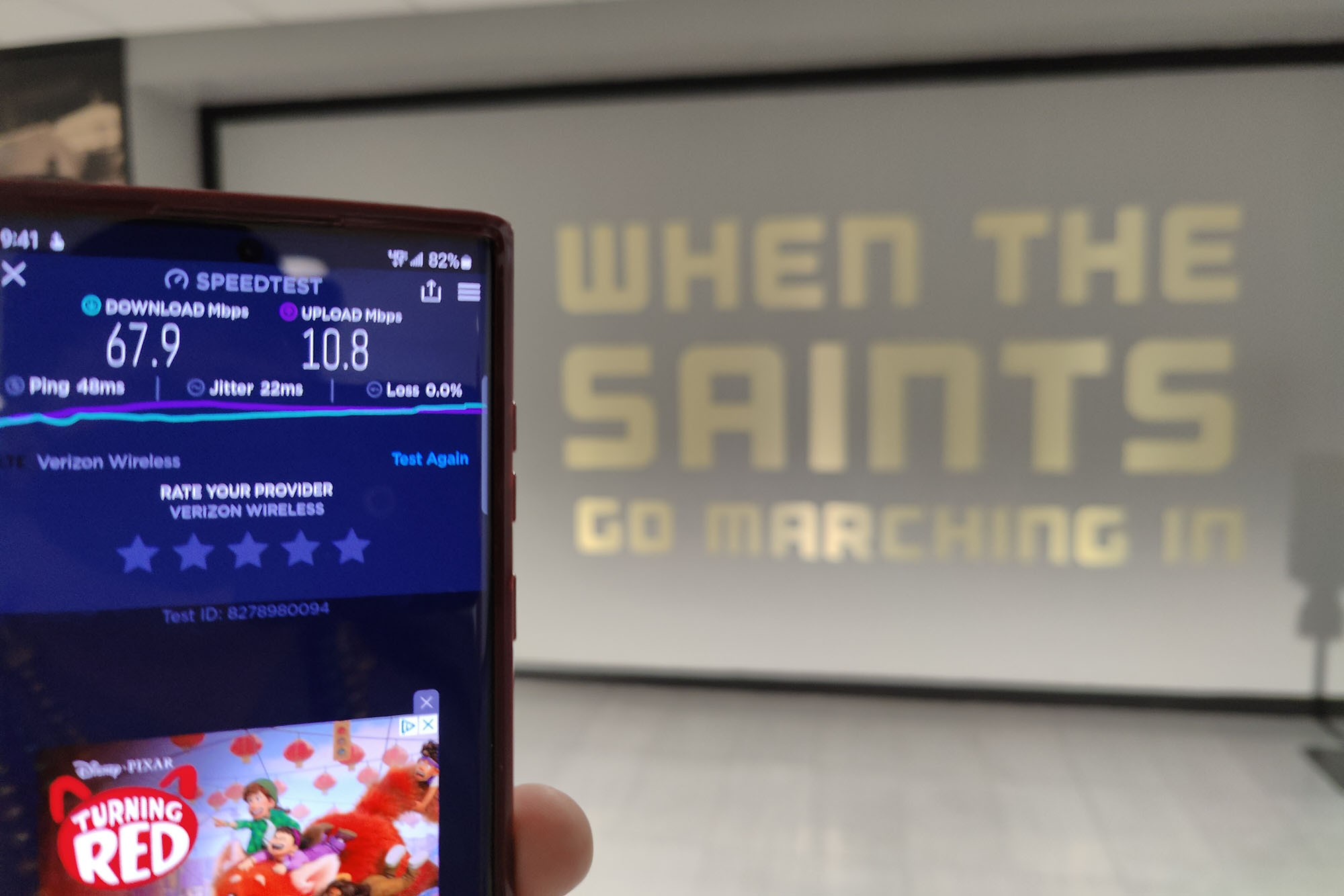 5G test with the Saints logo in the background.
