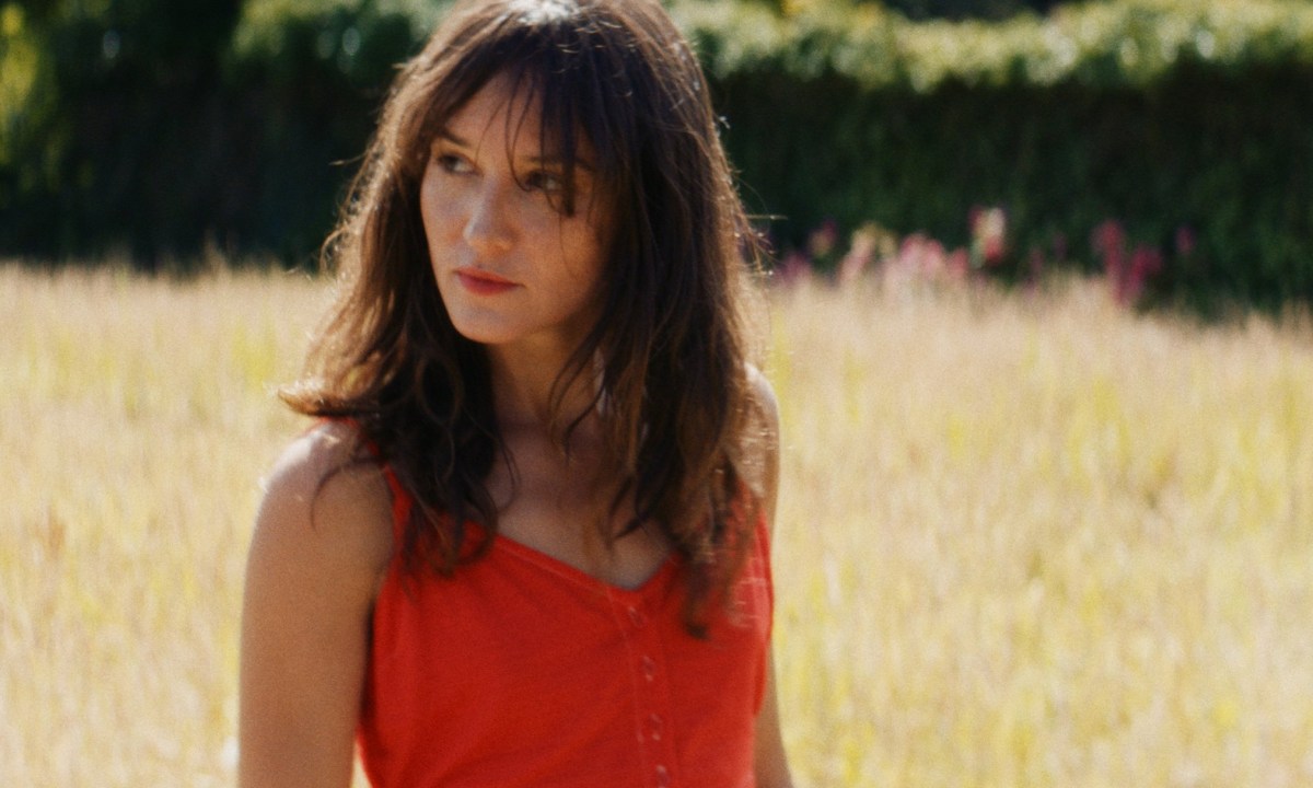 Anaïs Demoustier wears a red dress in Anaïs in Love.
