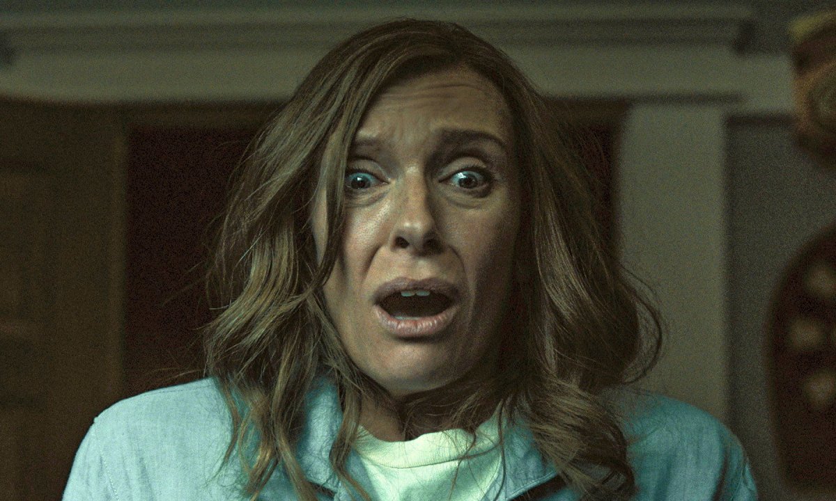 Toni Collette with a shocked and fearful expression in Hereditary from A24.