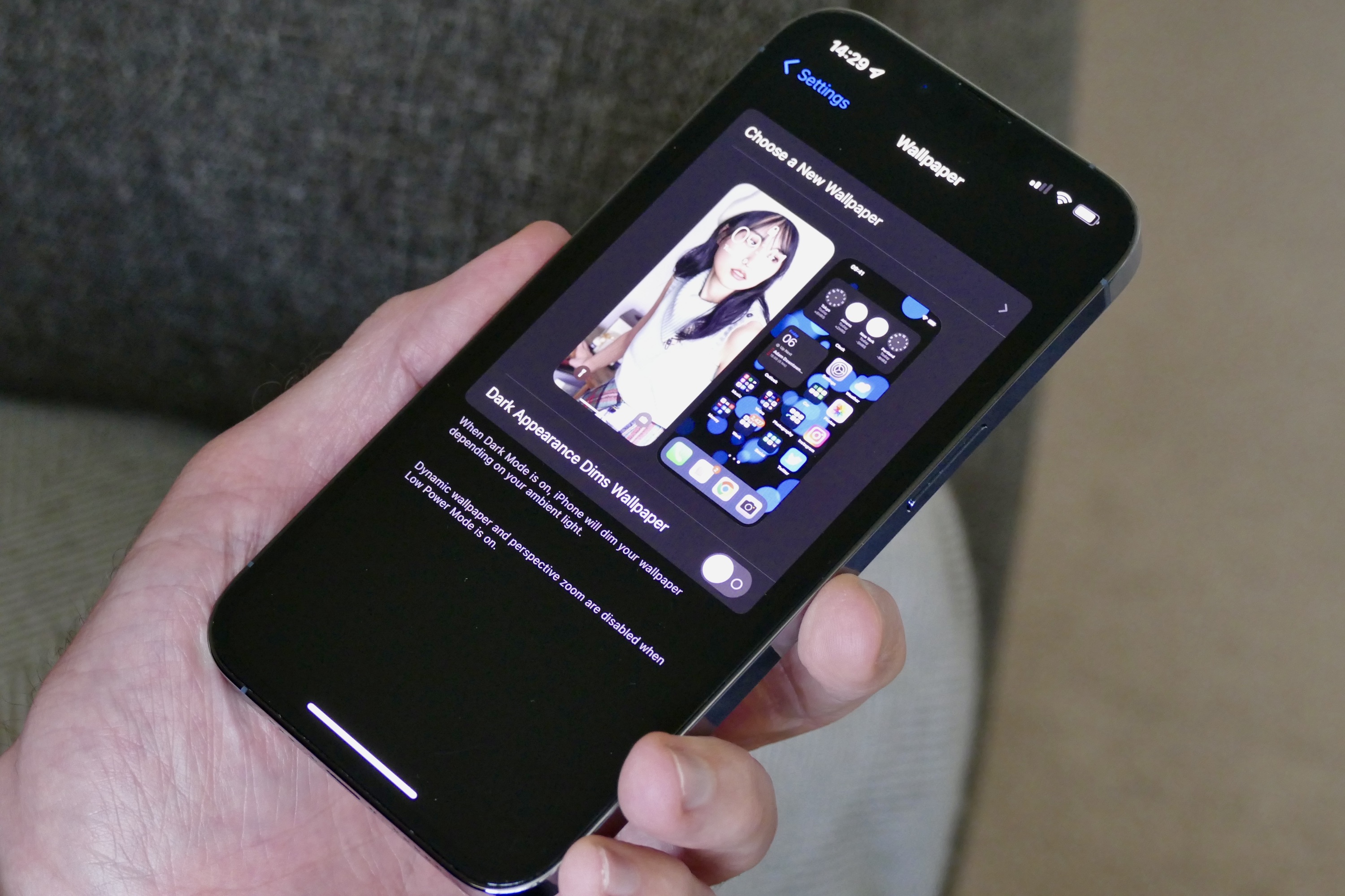 Choosing iOS wallpaper on an iPhone 13 Pro.