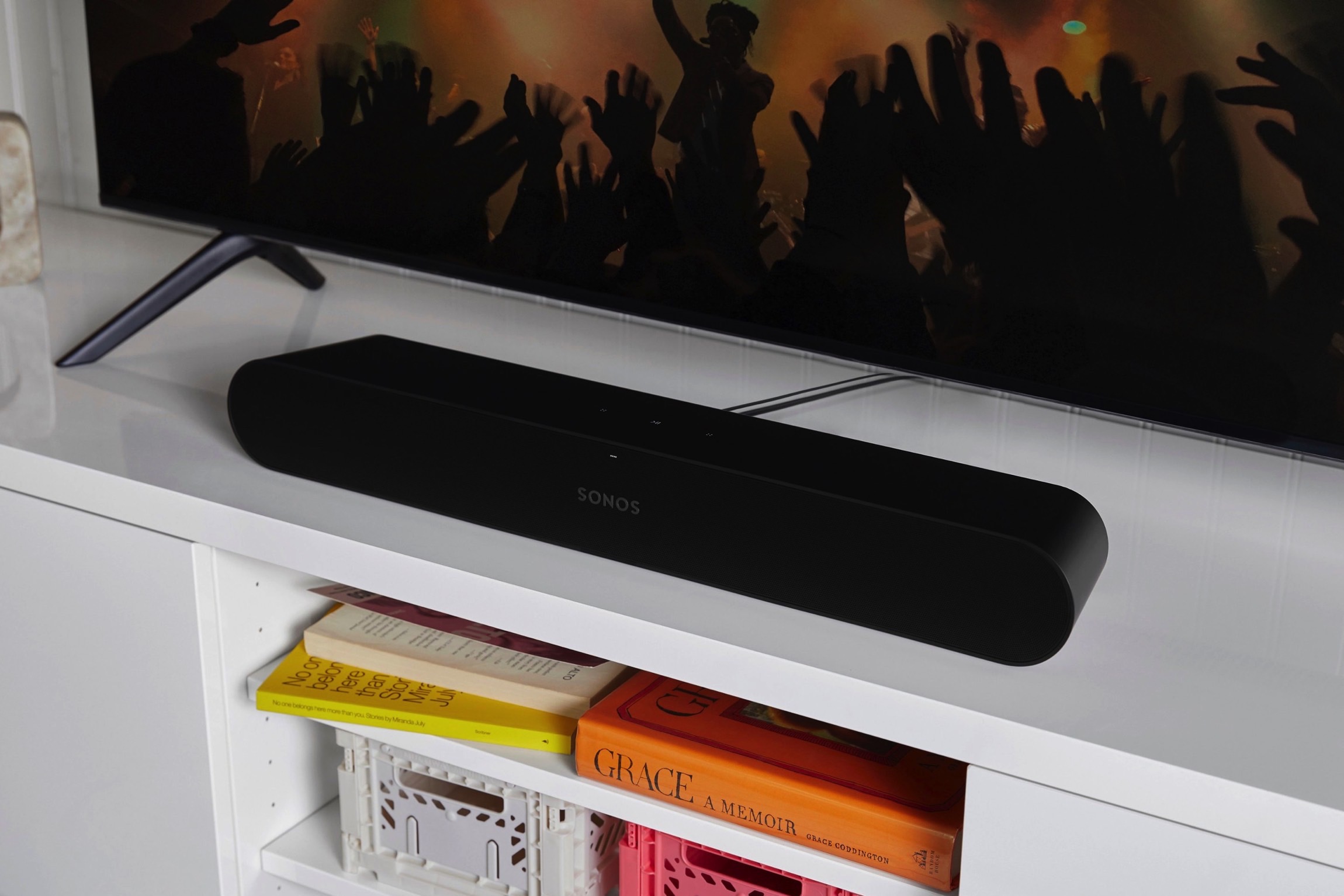 A leaked publicity photo of a new Sonos soundbar in black seen under a TV.