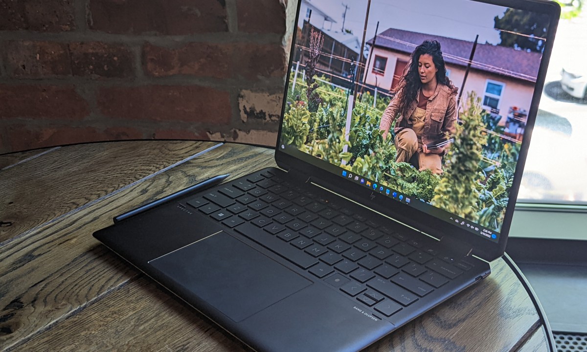 The HP Specre x360 13.5 inch sitting on a table.