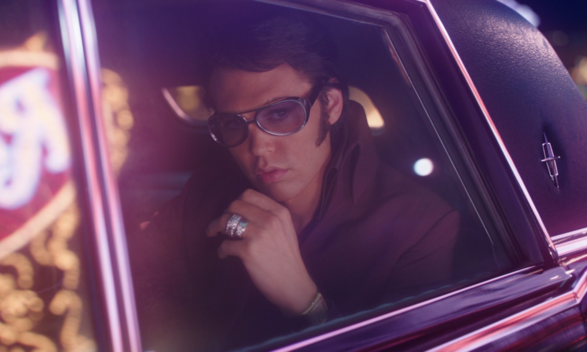 Elvis Presley looks out of a limo at Vegas in Elvis.
