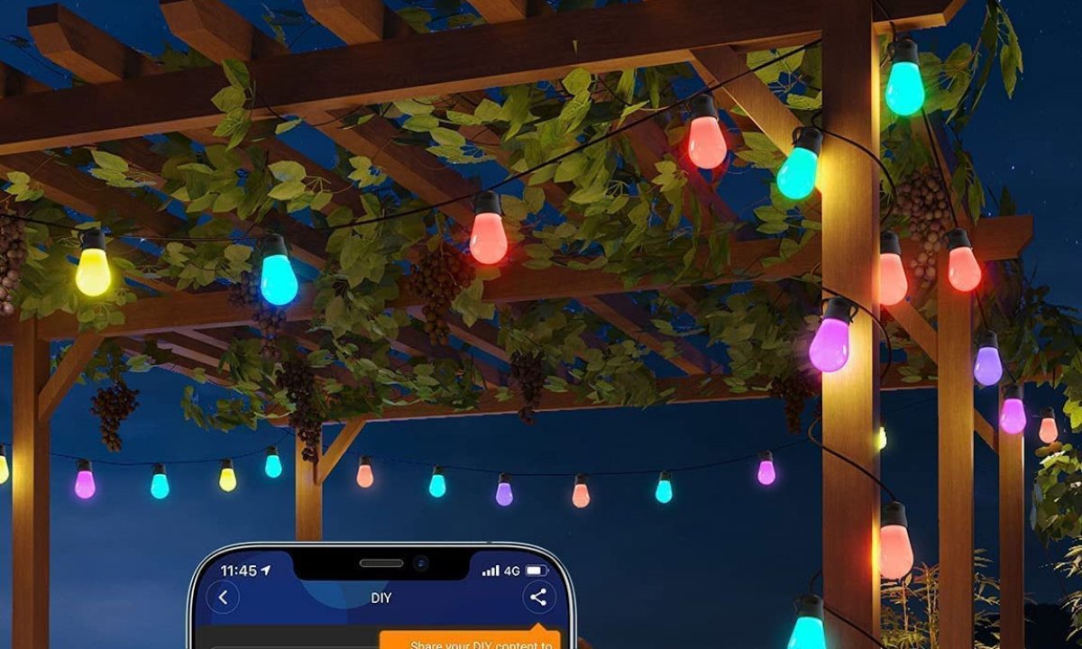 Govee Smart Outdoor String Lights set up on patio trellis at night.
