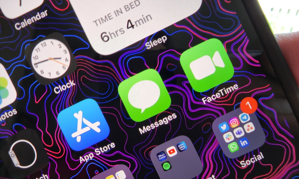 Apple Messages icon on iPhone display.