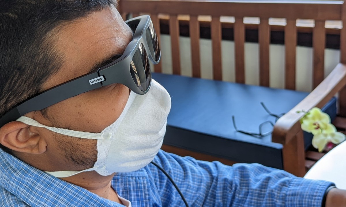 The Lenovo Smart Glasses T1 on a head