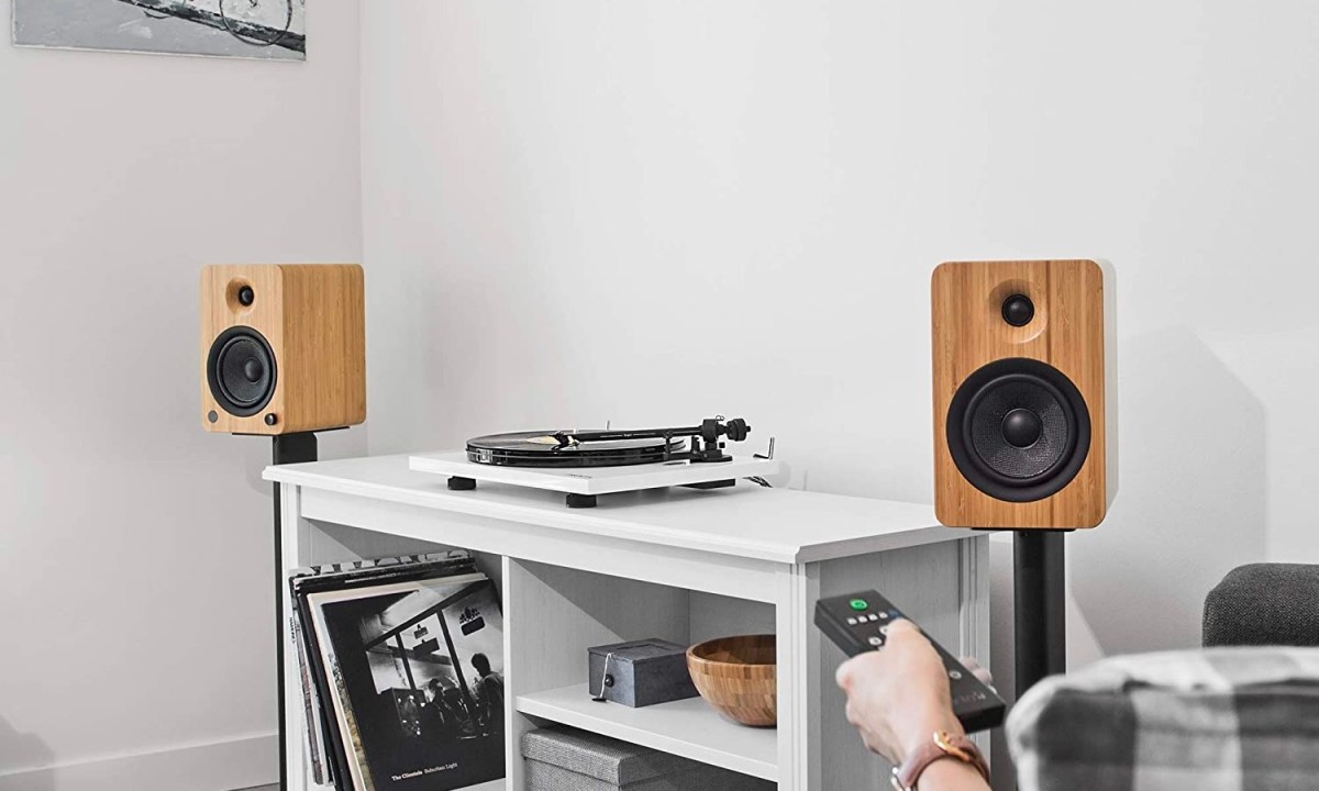 The Kanto YU6 speakers in a living room.
