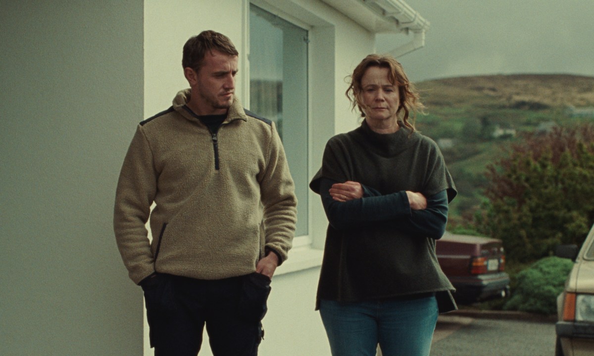 Paul Mescal stands outside a house with Emily Watson in God's Creatures.