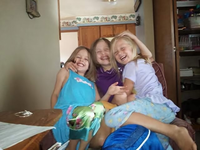 Photo of laughing young girls.