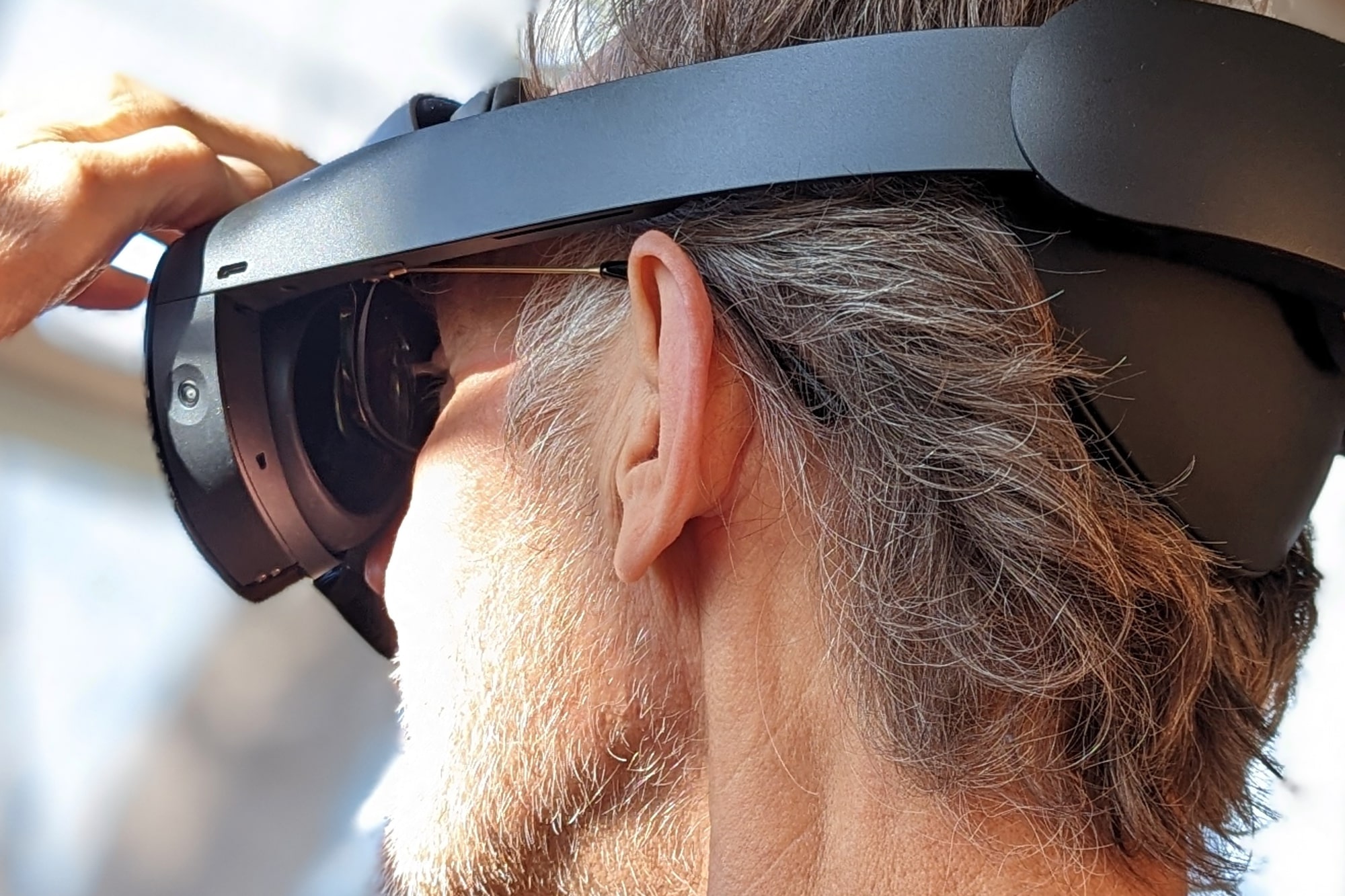 From a side view, you can see how glasses can be worn along with a Quest Pro.