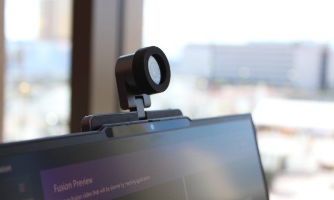 The ThinkBook 16p with the webcam attached up top.