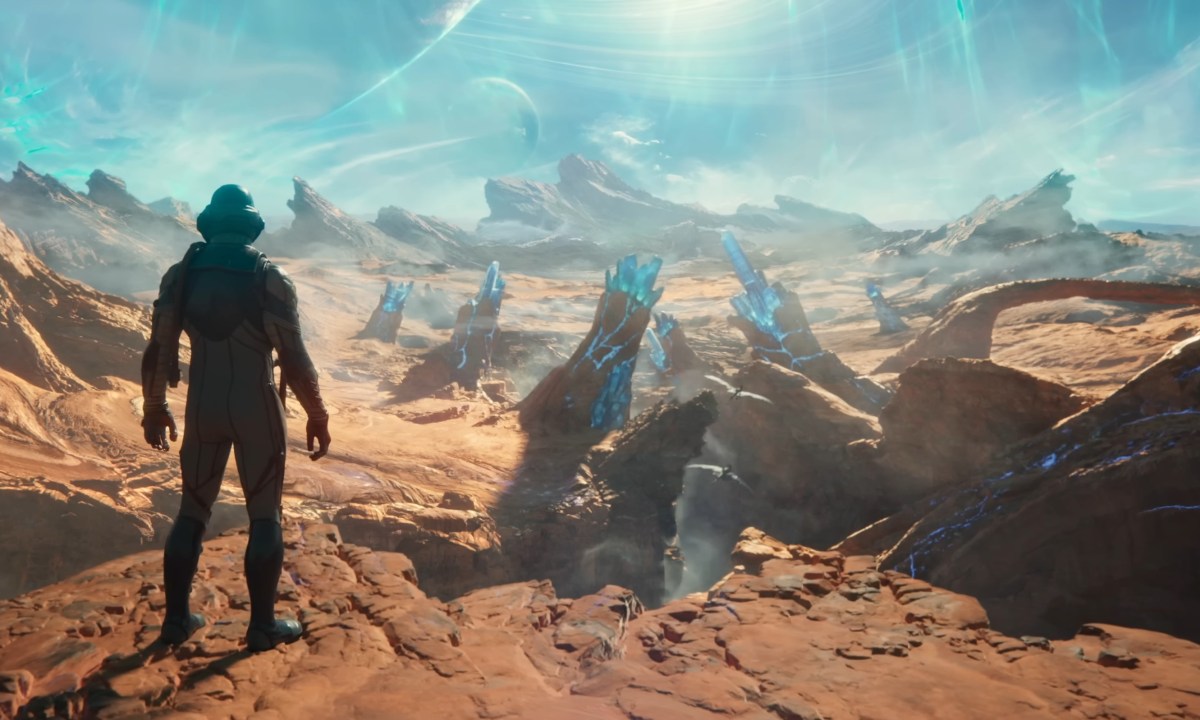 A person in a spacesuit looks out over and alien landscape in the trailer for The Outer Worlds 2.