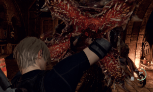 Leon fights off a parasite in Resident Evil 4's remake.