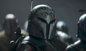 Bo-Katan stands near her fellow Mandalorians in The Mandalorian season 3 episode 7.