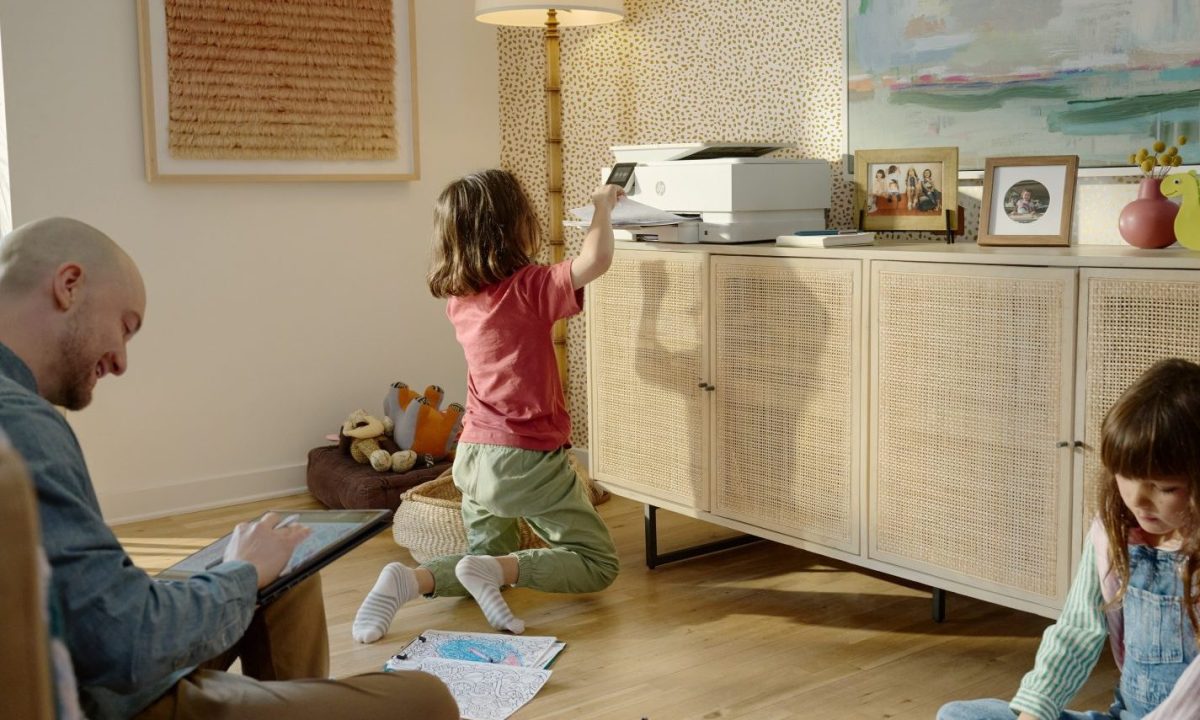 HP Envy Inspire printer being used in the living room.