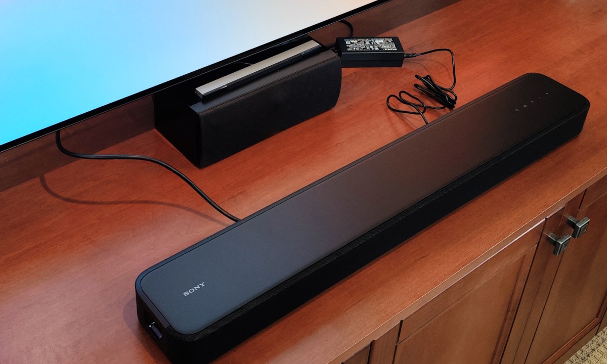 Sony HT-S2000 in front of a TV.