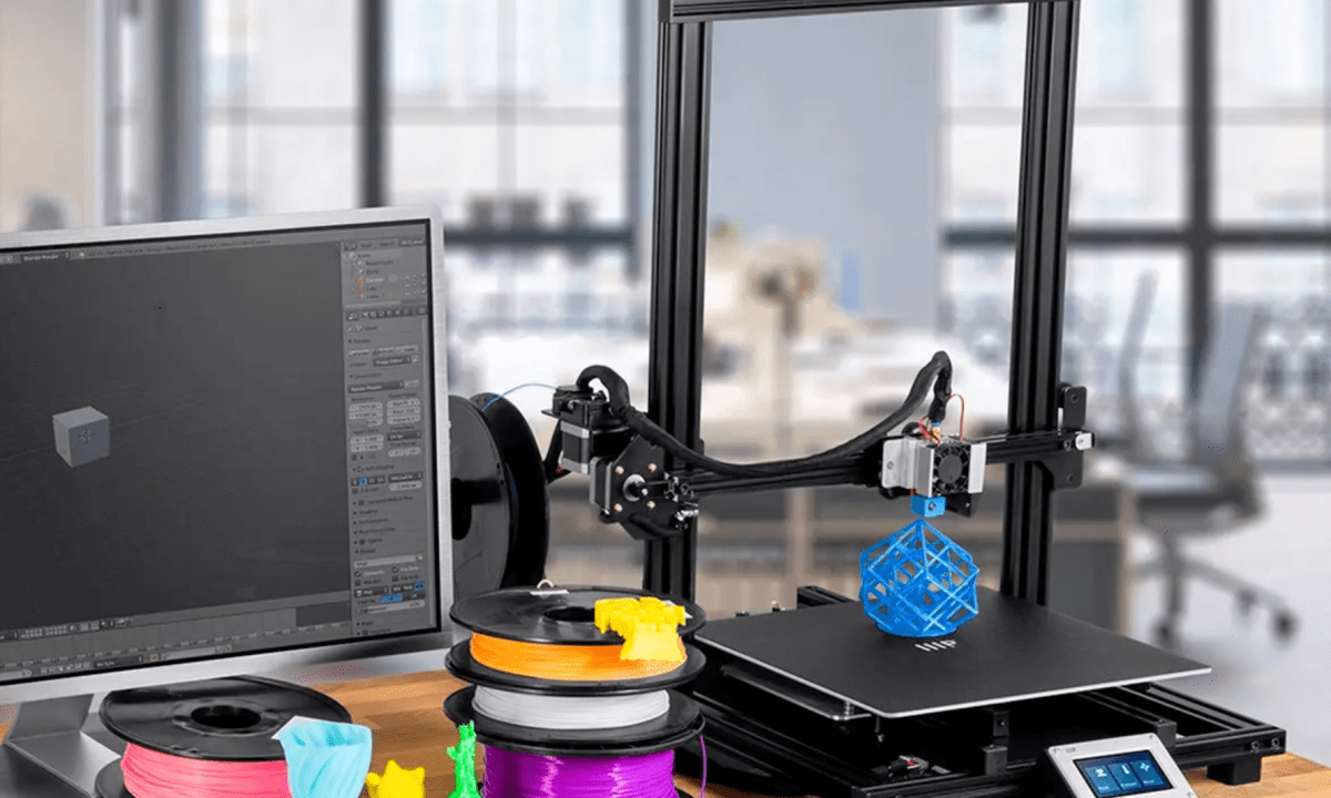 A Monoprice MP10 3D Printer is creating an octahedron in blue plastic.