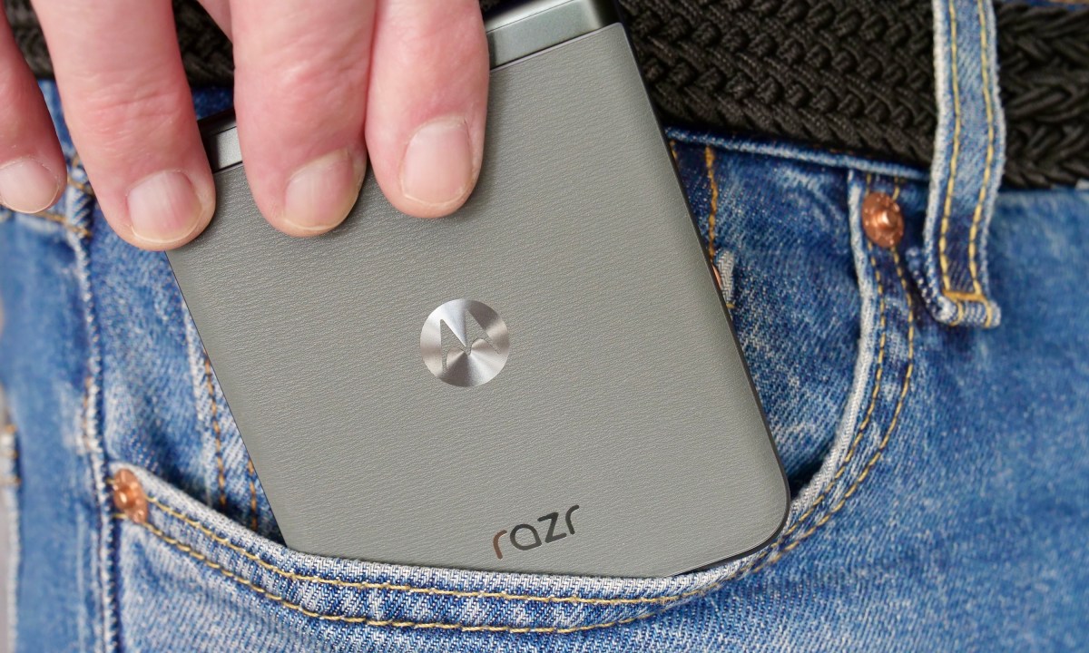 A person taking the Motorola Razr 40 out of a pocket.