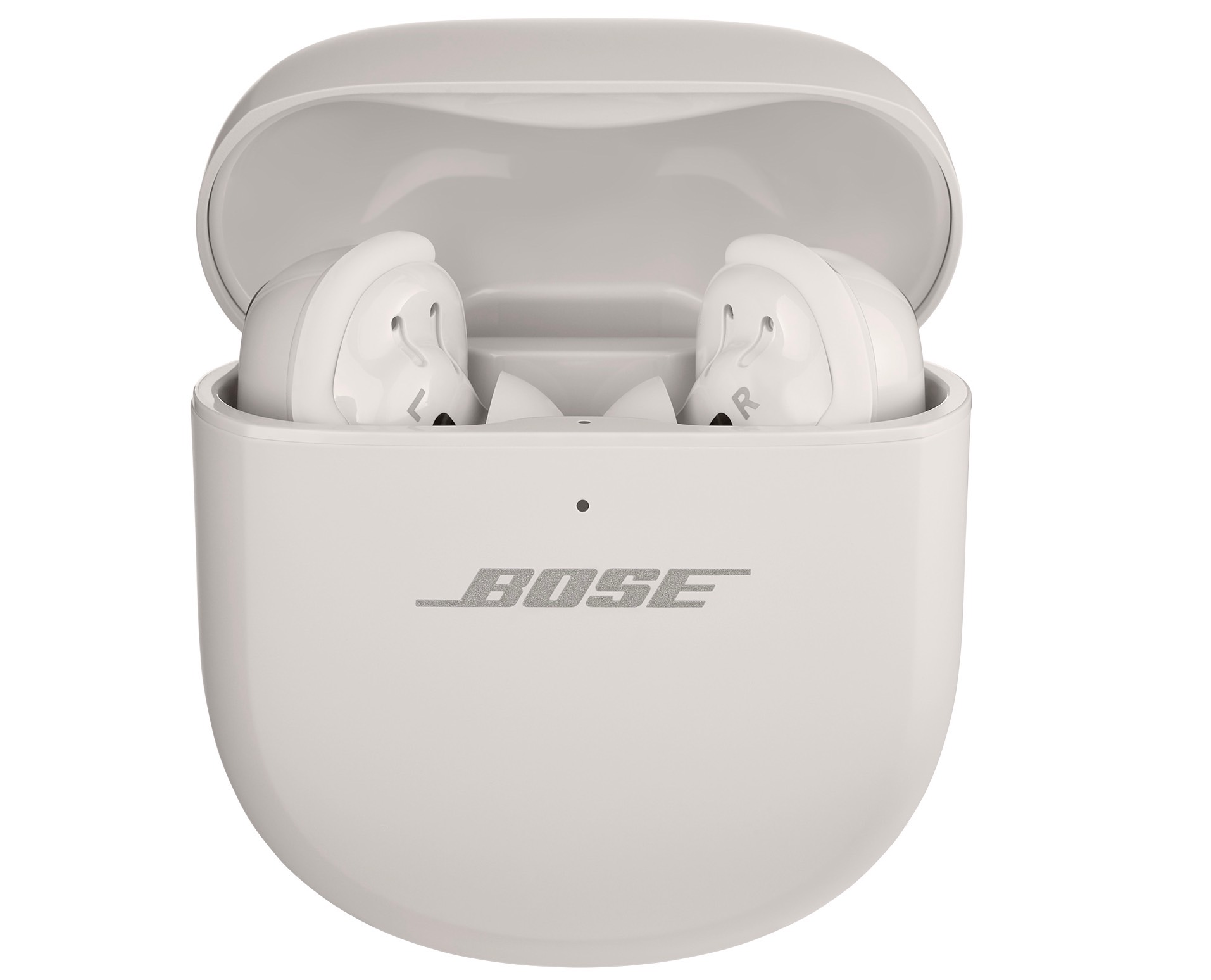 Bose QuietComfort Ultra Earbuds in white, sitting in charging case.