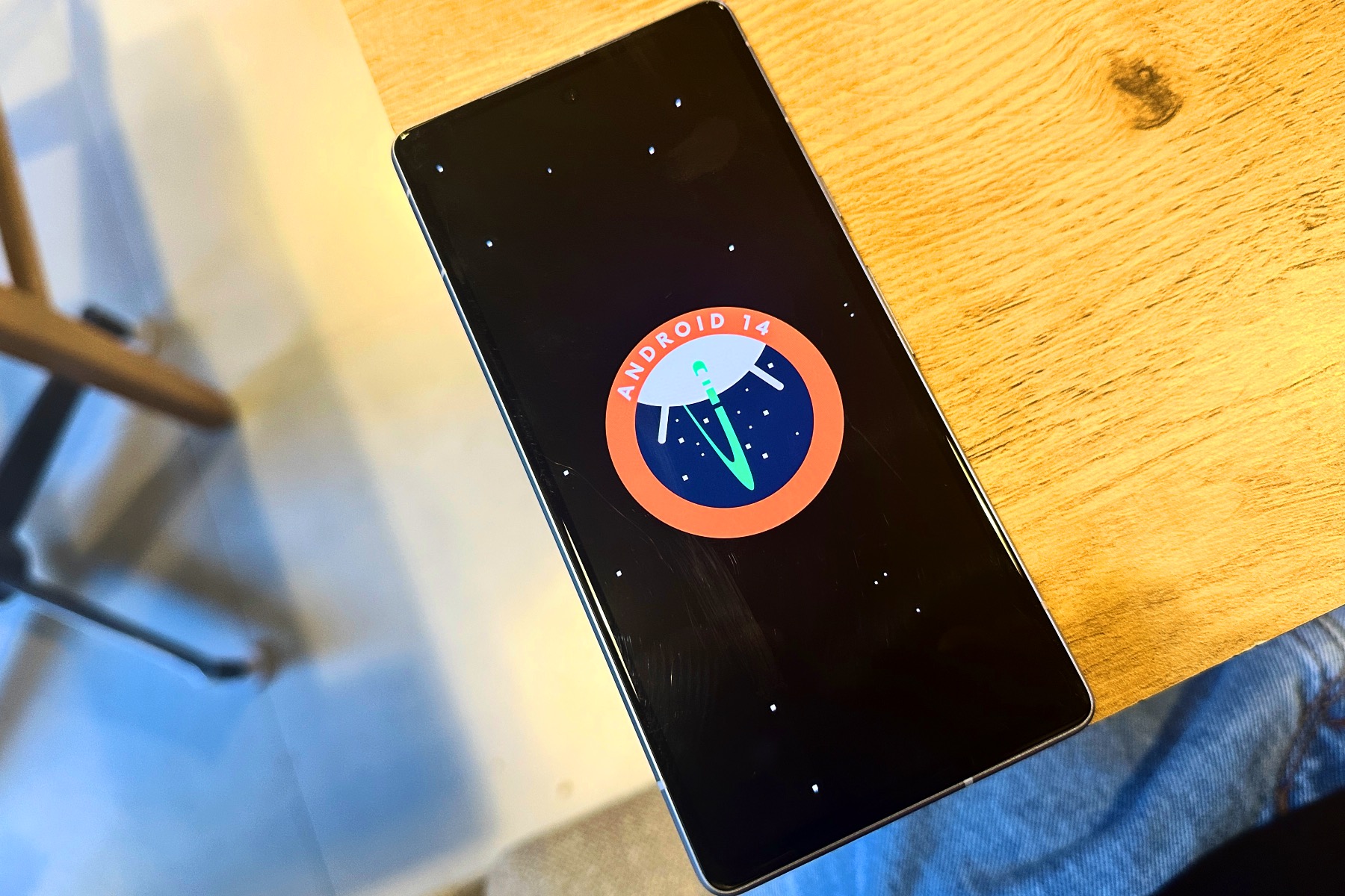 Official artwork for Android 14 on a Pixel 7a.