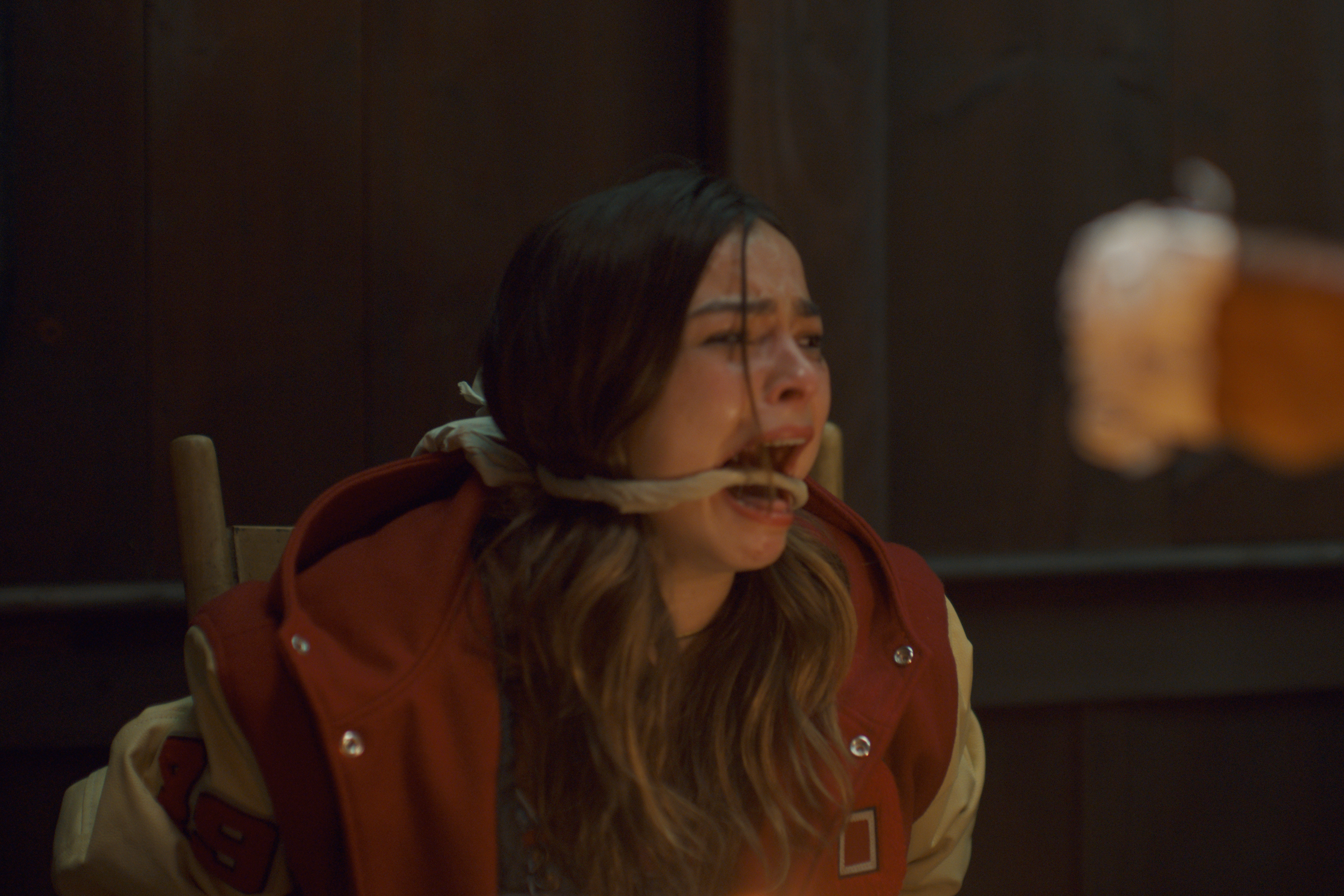 Addison Rae screams in Thanksgiving.