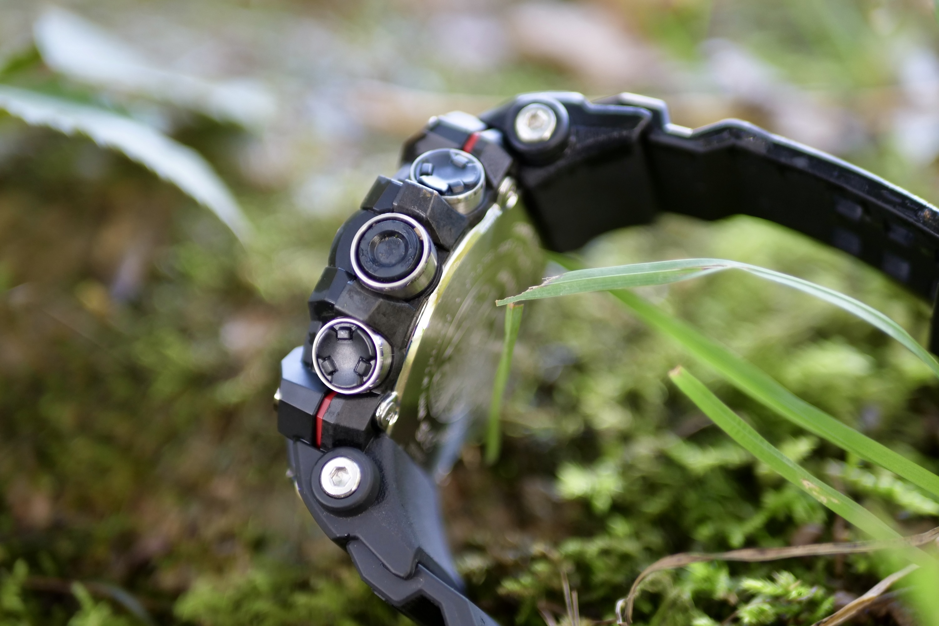 The G-Shock GW-9500 Mudman on some mud and grass.