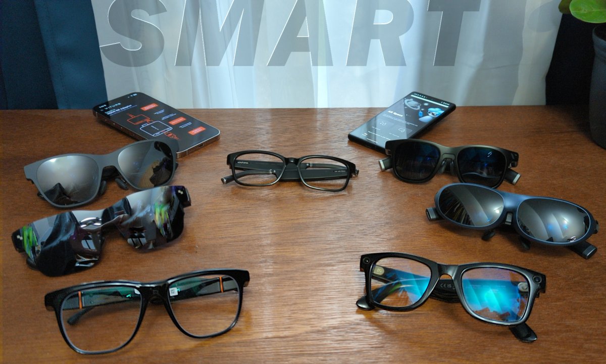 Smart in text above seven smart glasses with an iPhone and Android phone.