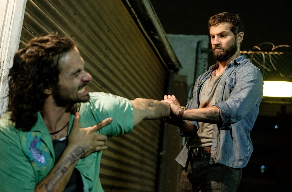 A man fights another man in Upgrade.