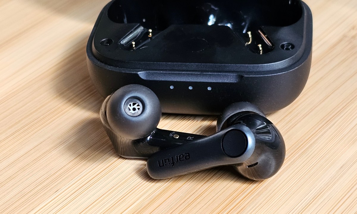 Earfun Air Pro 4 in front of case.