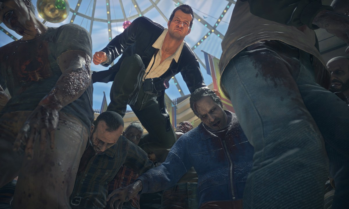 Frank West leaps over zombies in Dead Rising Deluxe Remaster.