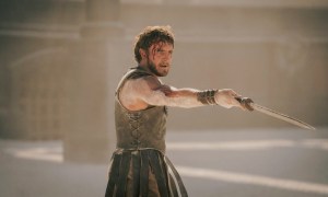 A man points his sword in Gladiator II.