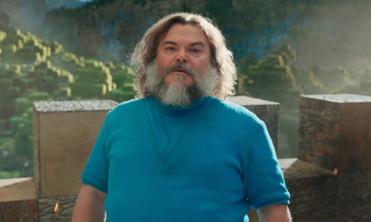 Jack Black stands near a castle wall in "A Minecraft Movie."