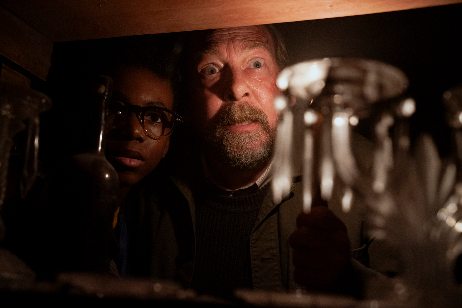 Mike and Matt peer through a shelf in Salem's Lot.