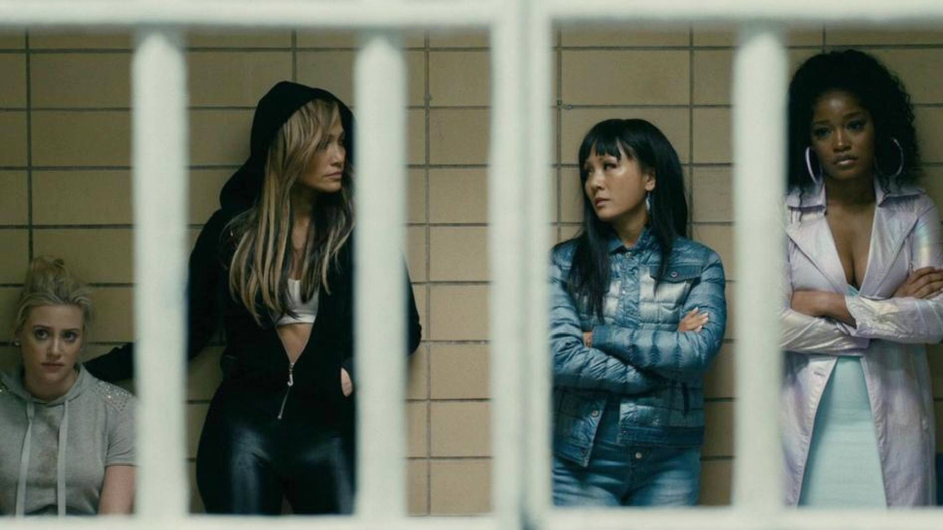 Four women are behind bars in Hustlers.