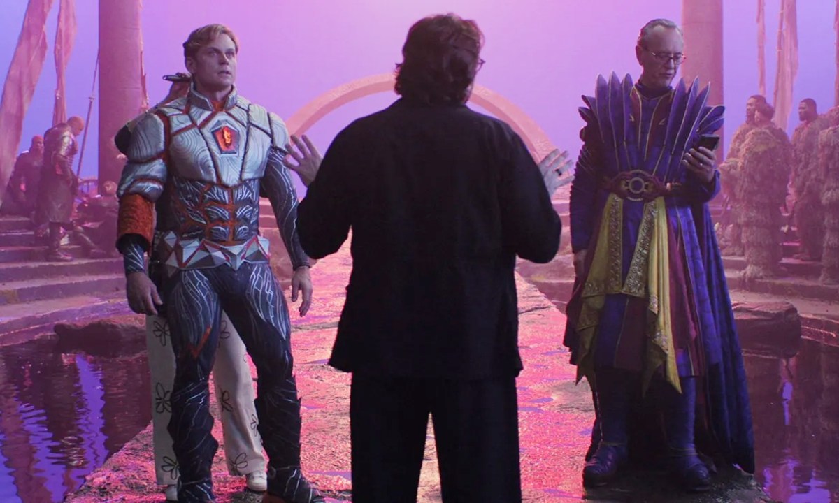 A director directs two male actors in The Franchise.